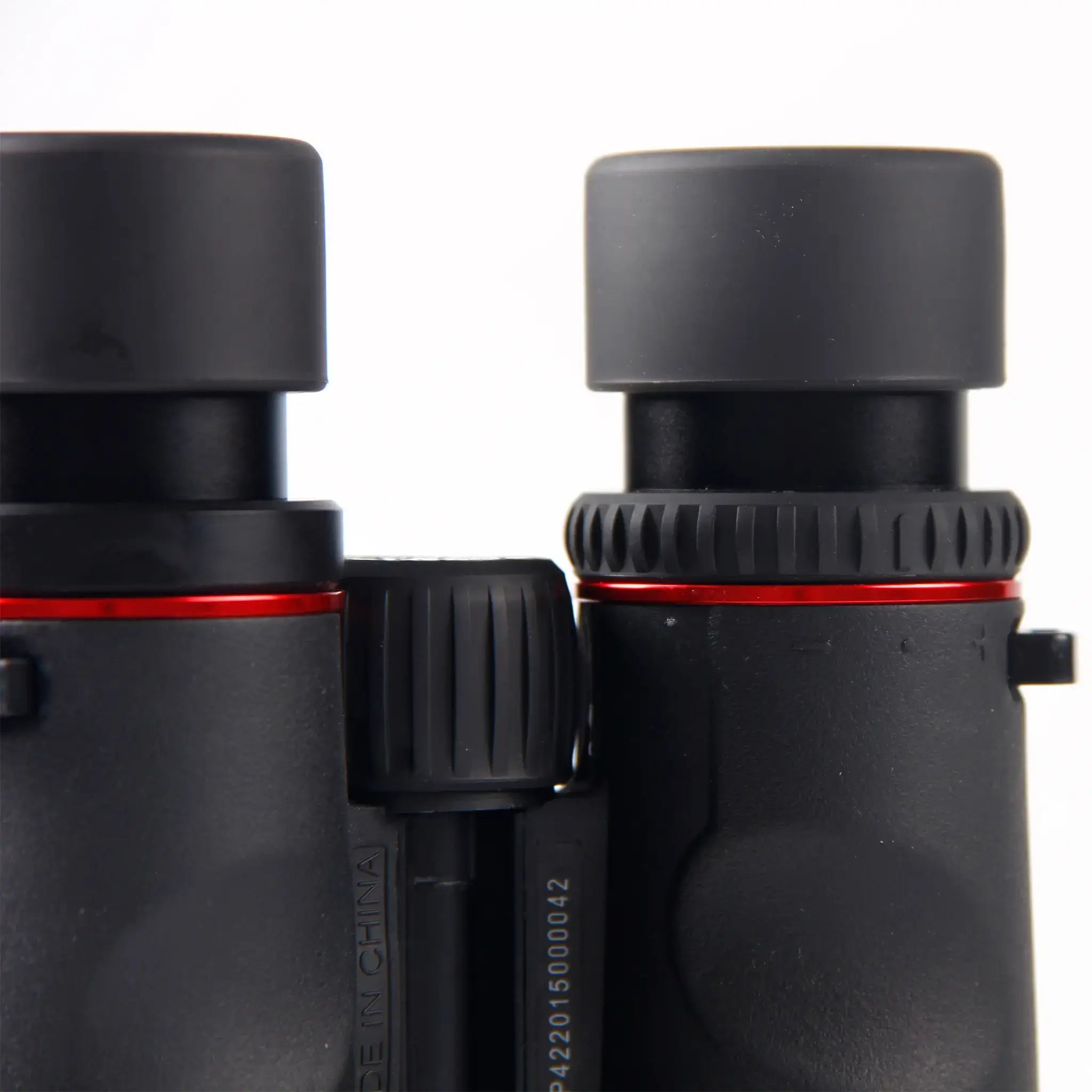 adjustable eyecup on APRESYS H1042ED 10x42 ED binoculars showing eye relief design for comfortable viewing with or without eyeglasses