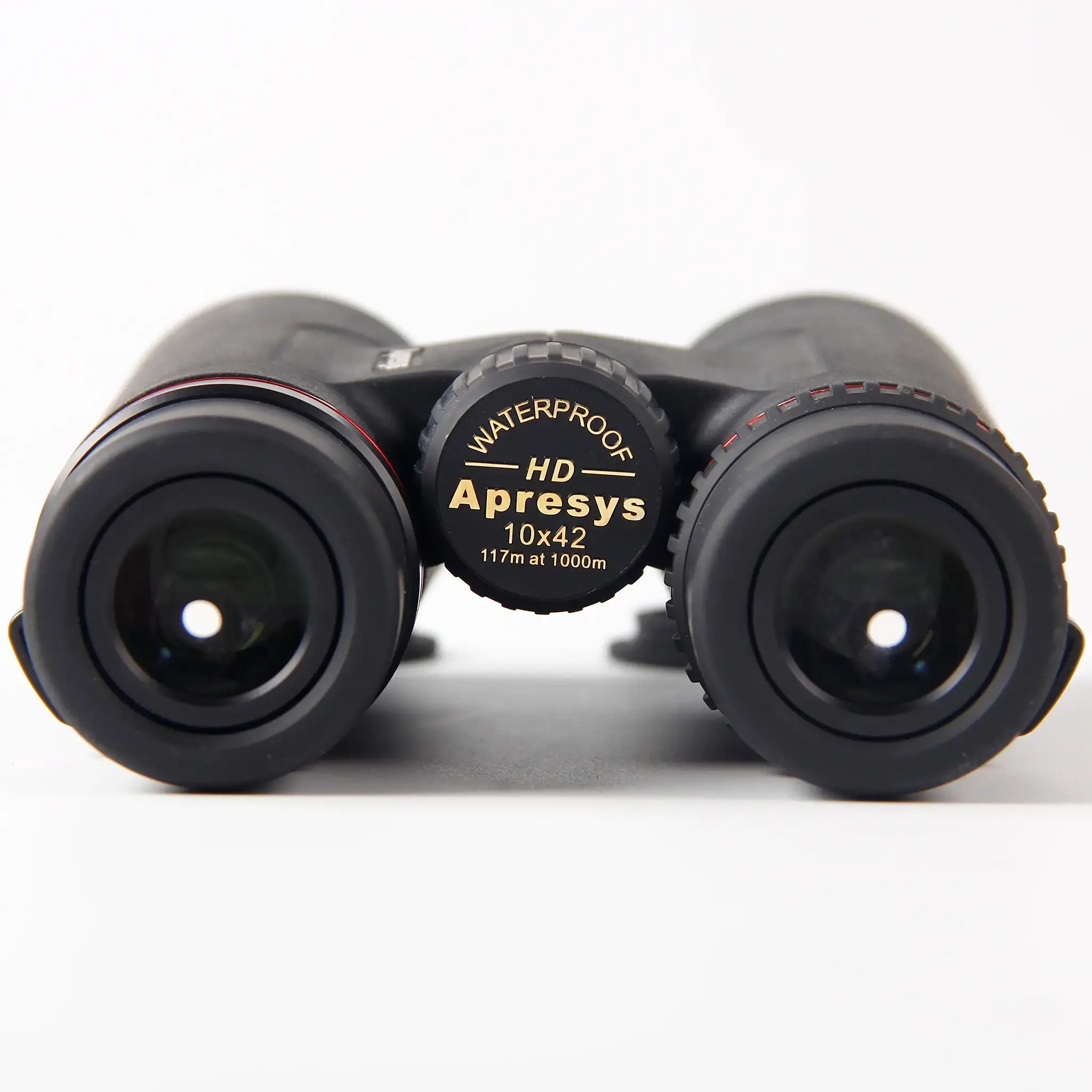 close-up of APRESYS H1042ED 10x42 ED binoculars eyepiece and focus wheel showing waterproof HD optics and 117m at 1000m field of view specification